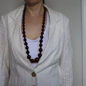 Burgundy necklace with chunky wooden beads.